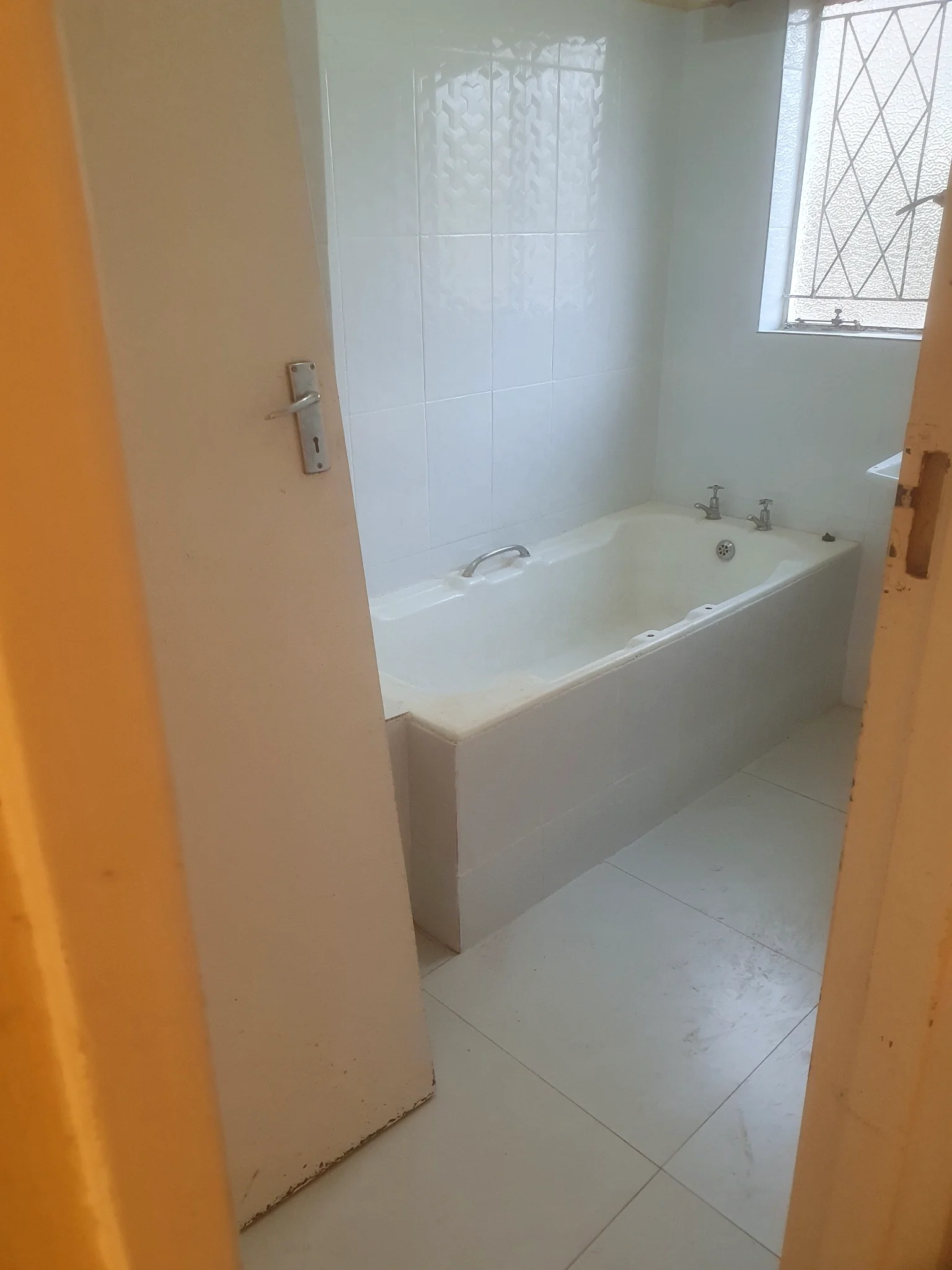 Bathroom tiling and bath fit-out